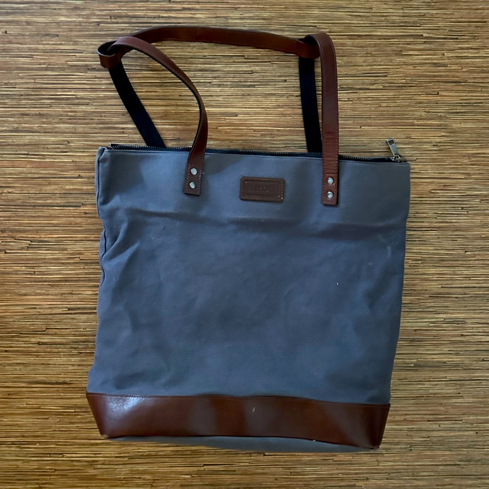 Grey/Navy Arch Diaper bag; canvas and leather diaper convertible backpack
